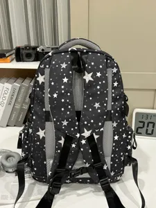 Black star pattern casual backpack with breathable mesh padded shoulder straps for daily school use.