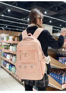 Zaino scolastico rosa carino con fiocco e tasca frontale, borsa casual leggera per ragazze.