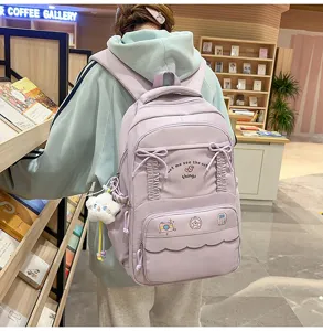 Zaino viola pastello carino per ragazze con fiocchi e volant, borsa scolaretta leggera.