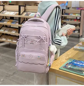 Bellissimo zaino viola taro per la scuola e i viaggi con dolci fiocchi e volant graziosi.