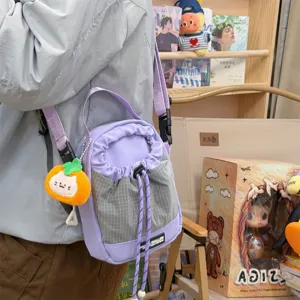 Purple plaid drawstring bucket bag, cute plush orange pendant, outdoor casual crossbody bag