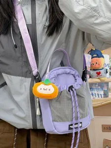 Purple grid bucket bag for women, cute plush cat pendant casual crossbody shoulder bag for daily travel.