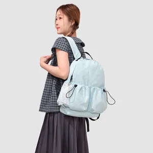 Mochila azul clara con cordón detalle, linda mochila escolar casual para estudiantes y viajes.