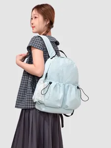 Mochila escolar ligera y casual de nailon con bolsillo de cordón y bonito lazo de perlas para mujeres y estudiantes