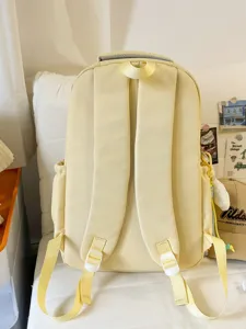 Zaino scolastico casual leggero in tela tinta unita per studenti, viaggi e vita quotidiana.