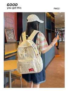 Sac à dos décontracté imprimé d'étoiles beige clair avec lettres brodées pour voyage.