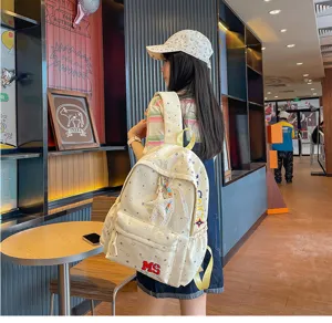 Sac à dos en toile imprimé étoiles jaune crème, cartable décontracté pour voyage.