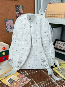 Sac à dos décontracté à motif d'étoiles pour les voyages scolaires et quotidiens.