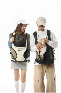 Portable outdoor pet front carrier backpack with breathable mesh for comfortable travel.