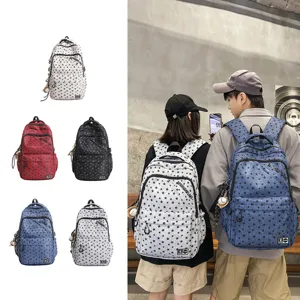 Retro street style couple backpack with star print, multi-compartment daily school bag details.