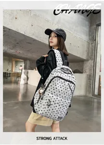 Retro street style star print backpack with multiple compartments for students daily use.