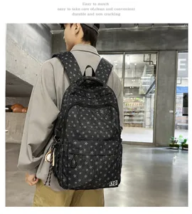 Retro street style backpack with star pattern, multi-compartment student school bag for daily use.