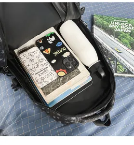 Retro street style multi-compartment canvas backpack for students, large capacity bookbag.