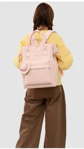 Stylish pink backpack with a matching small round pouch, perfect for casual daily use.