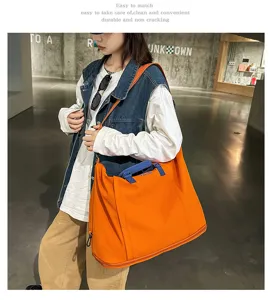 Grande borsa da viaggio arancione, borsa sportiva estensibile e borsetta da donna per tutti i giorni.