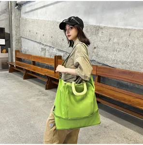 Borsa da viaggio espandibile verde per donna, grande borsa sportiva fitness con manico.