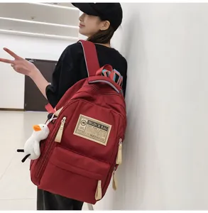 Multi-compartment casual canvas backpack for students, durable travel daypack with duck.