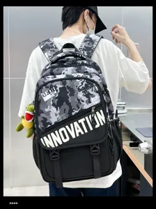 Stylish camouflage tactical backpack for students, large capacity casual school bag.