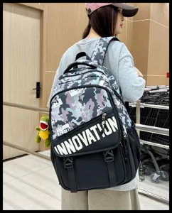 Detail view of stylish camouflage backpack with innovation print, casual student bookbag.