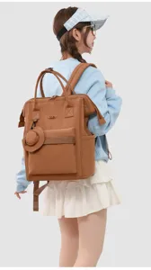 Brown multi-pocket mommy backpack with top handles, spacious main compartment and shoulder straps.