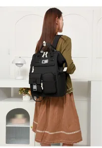 Japanese minimalist solid color multi-pocket mommy backpack, casual daily travel bag for moms.
