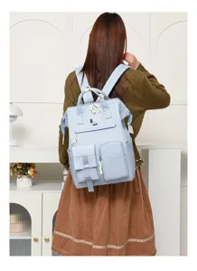 Japanese minimalist solid color multi-pocket mommy backpack for casual travel and daily use.
