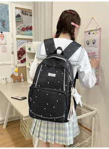 Black star pattern school backpack for student casual daily travel with cute lace trim design.