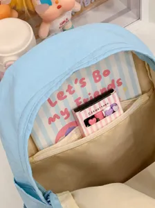 Detailed view of the light blue mini backpack interior, showing inner pockets and zipper.
