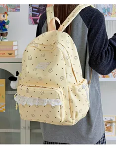 Japanese Lolita style cute star print canvas backpack with lace trim for casual daily travel.