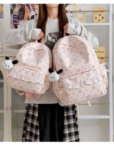 Cute pink lolita style ruffles bow backpack with star pattern and sweet puppy plush pendant.
