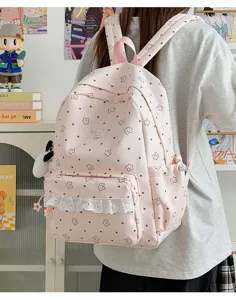Pink sweet lolita backpack with star print and white lace ruffle detail for daily cute style.