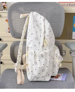 Cute Japanese Lolita style backpack with sweet star pattern and bow lace trim for daily use.