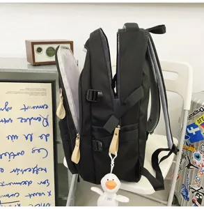 Black tactical backpack with multi-compartments, durable school bag for students and travel use.