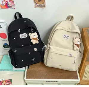 Sac à dos mignon style japonais avec pendentif ours et broderie douce pour l'école et voyage.
