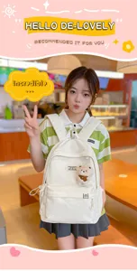 Joli sac à dos blanc en toile style japonais avec pendentif ours en peluche pour filles voyage.