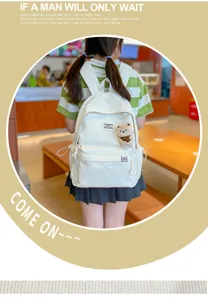 Sac à dos d'école pour fille mignonne, cartable préppy élégant avec joli pendentif d'ours.