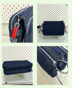 Denim schoudertas detail, meerdere ritsvakken, duurzame geweven schouderriem, casual stijl.
