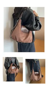 Brown suede vintage hobo backpack bag detail shot showcasing soft texture and leather flap.
