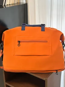 Amplio bolso de viaje bicolor naranja y azul, bolsa de deporte extensible para gimnasio.