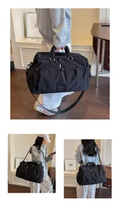 Vue détaillée du sac de voyage noir avec bandoulière réglable et poches de rangement.