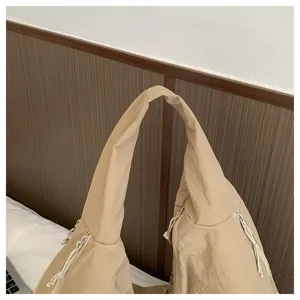 Korean style minimalist pleated shoulder bag detail, solid color handbag for commute.