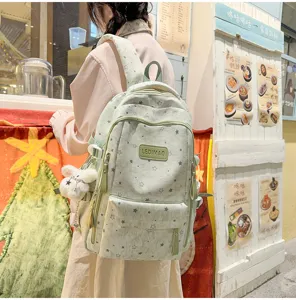 Light green star print school backpack casual student book bag with cute plush pendant detail