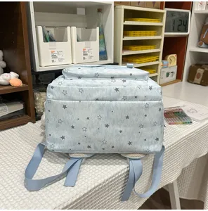 Cloud-sense fog blue dreamy star print backpack, Korean ins style school bag for teenage girls.
