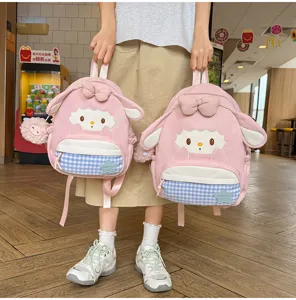 Joli sac à dos d'école design mouton kawaii pour filles, sac de voyage doux avec nœud et poche.