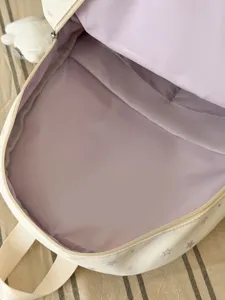 Cute star print canvas backpack with purple lining, perfect for daily casual school use and doll display.