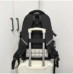 Sac à dos étudiant noir multifonction avec sangle de valise et dos rembourré respirant.