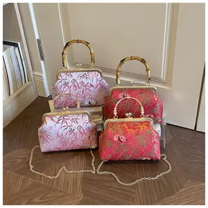 Vintage Chinese style kiss lock bag with panda bamboo print, retro brocade shoulder bag.