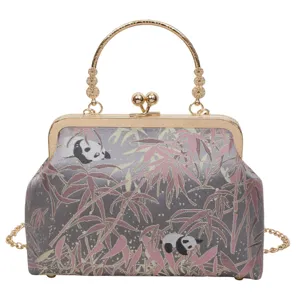 Chic Chinese style retro kiss-lock handbag with panda and bamboo brocade design.