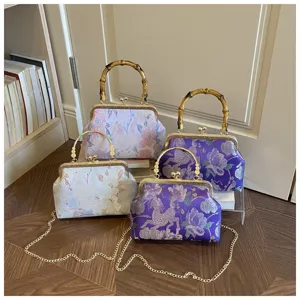 Vintage Chinese stijl brokaat avondhandtas met bamboe handvat, elegante schoudertas.