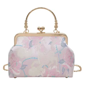 Vintage Chinese stijl brokaat avondtas met metalen handvat en kluitsluiting voor dames.